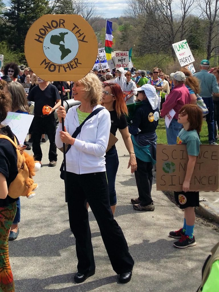 Earth Day Climate Rally. Getting involved improves coping with anxiety.