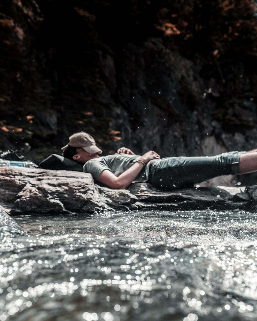 Relaxing by a stream